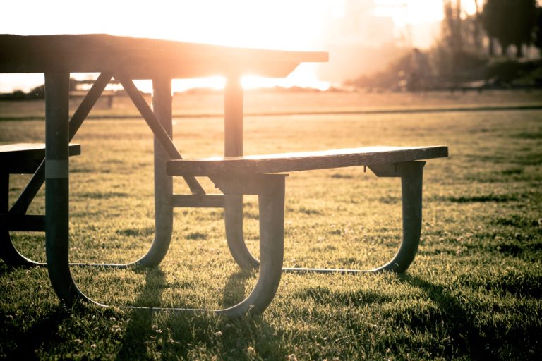 picnic table at sunset or sunrise.