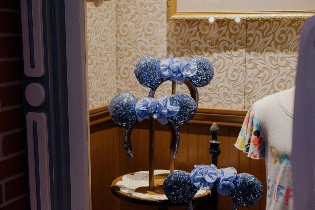 Display of 3 sparkly blue mickey mouse ears