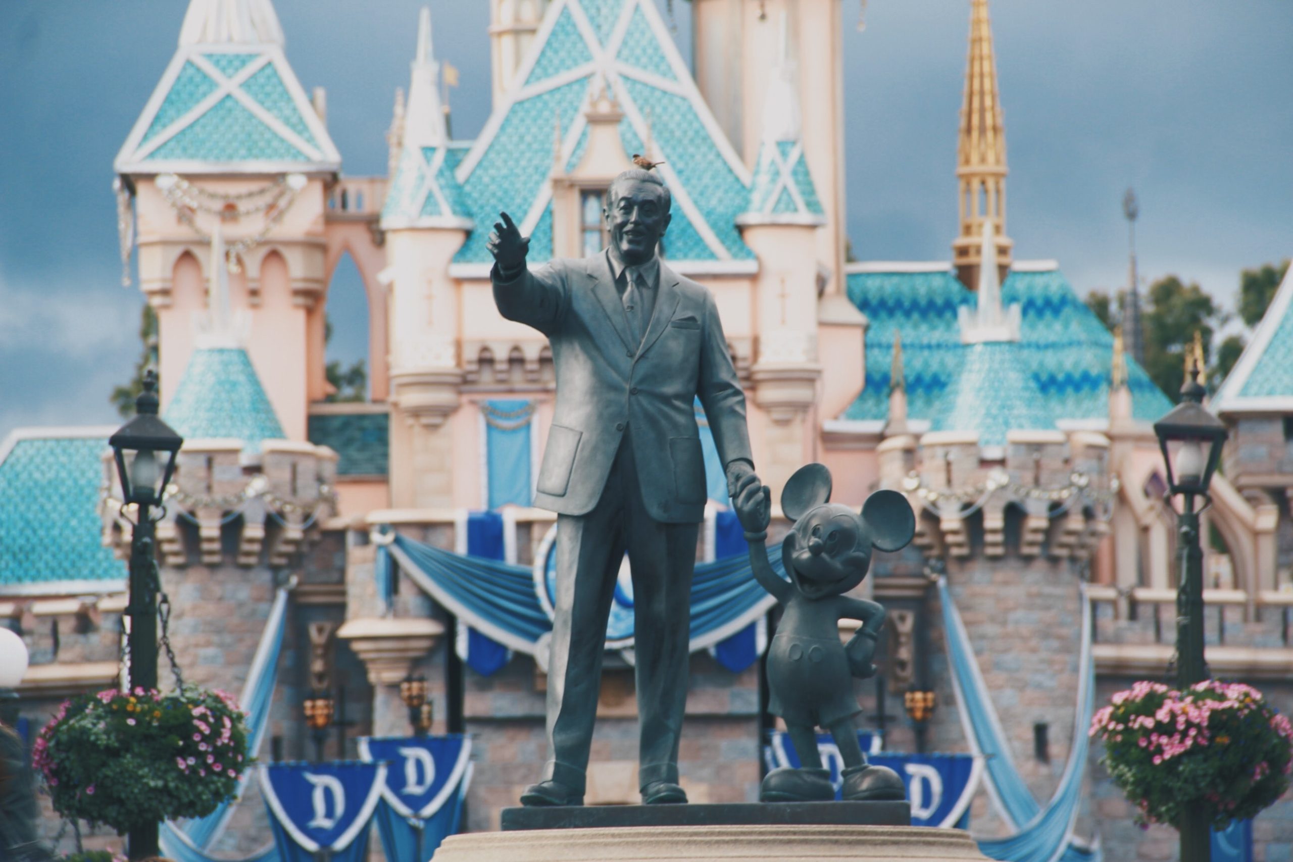 statue of walt disney and mickey mouse at Disneyland Anaheim California