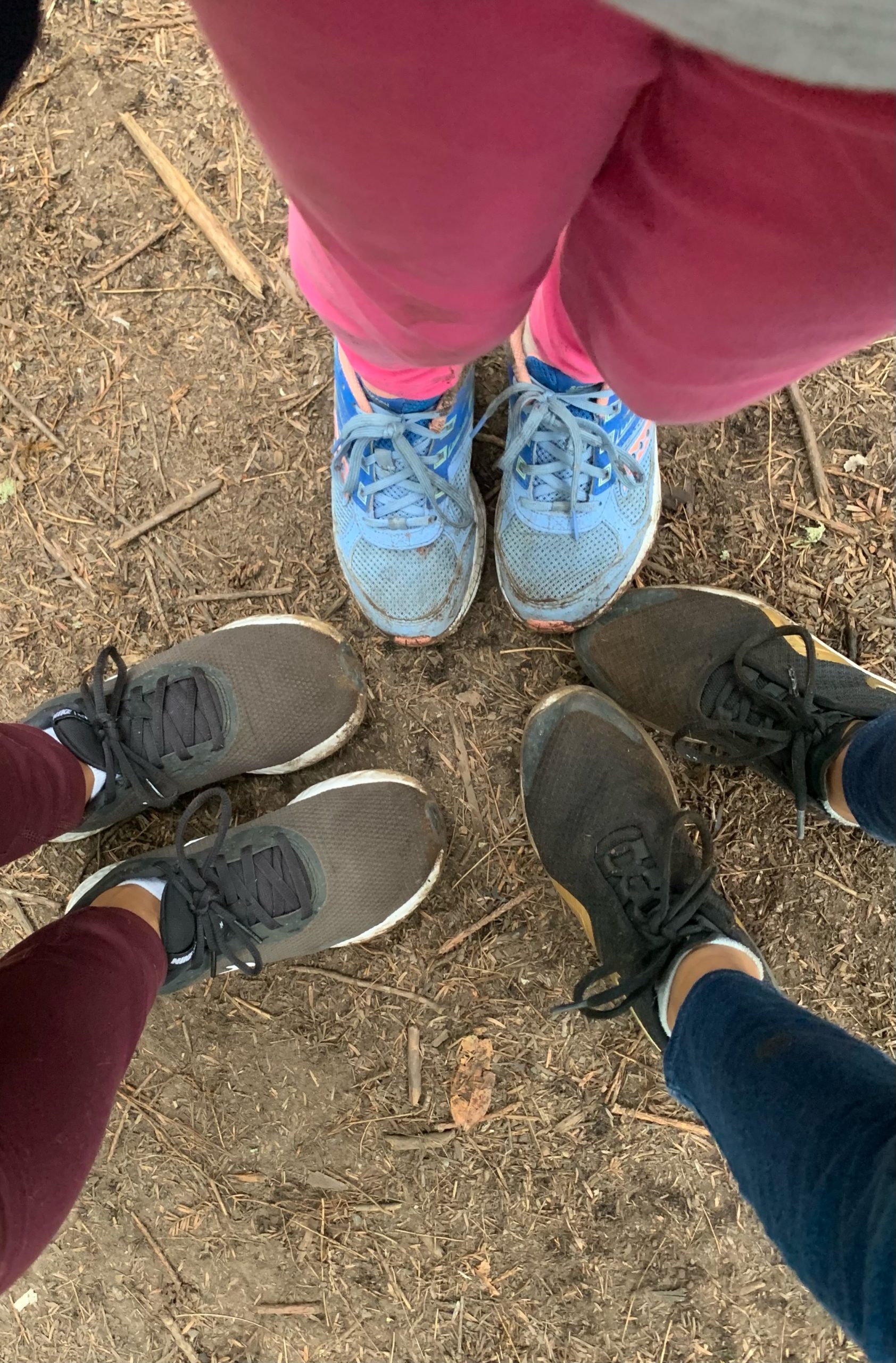 dirty sneakers on a dirt path