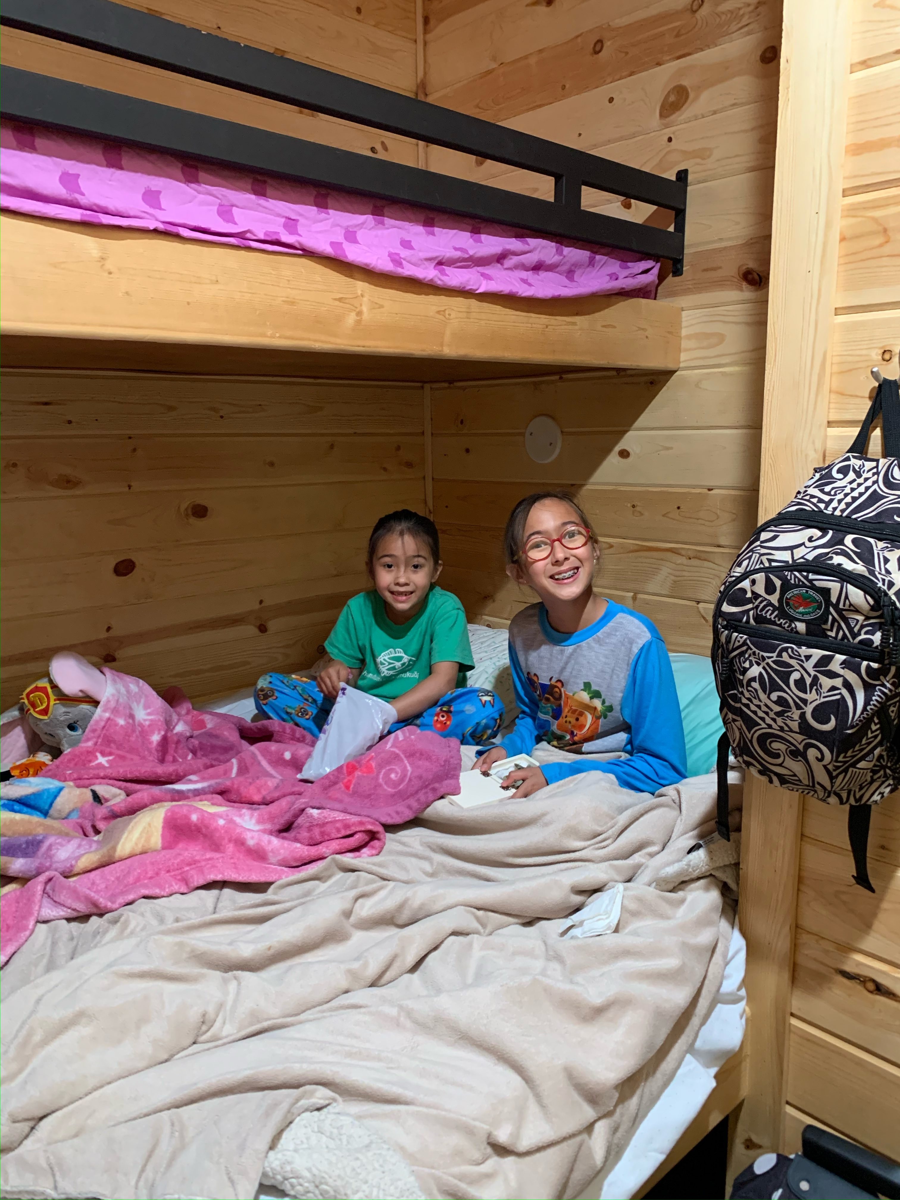 two girls on a bunk bed at Jellystone in Lodi, California