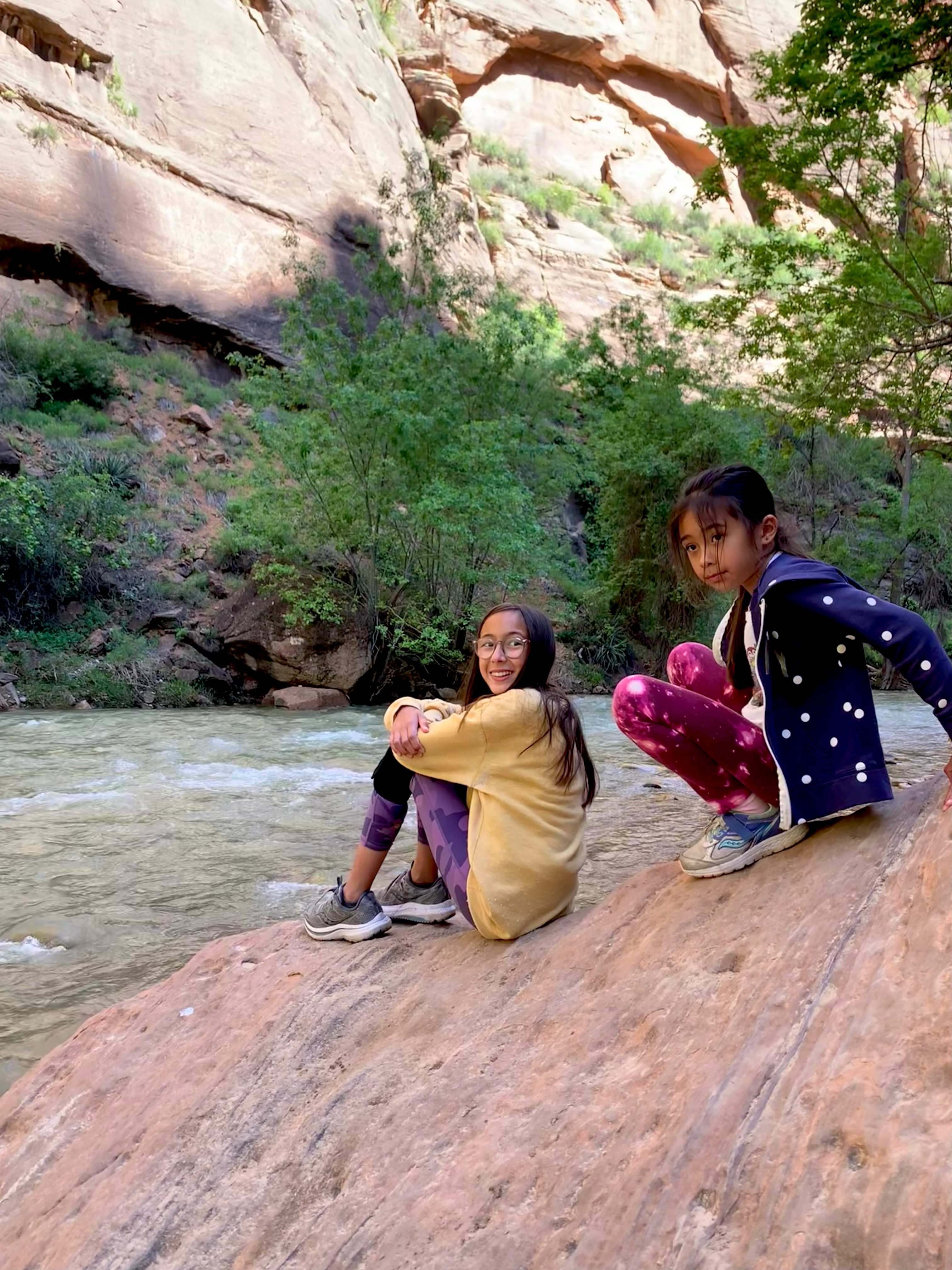 two girls by the virgin river in zion national park